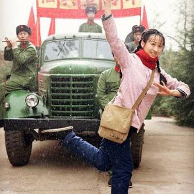练束梅