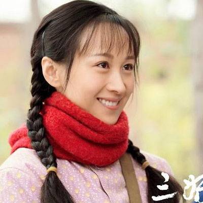 练束梅