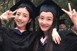 豆得儿晒毕业照 骑男子脖子上异性缘特好（图）