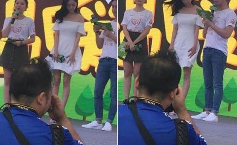 杨幂短裙被吹起