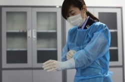 吉林女法医9年解剖尸体1000余具 现实版法医高亚